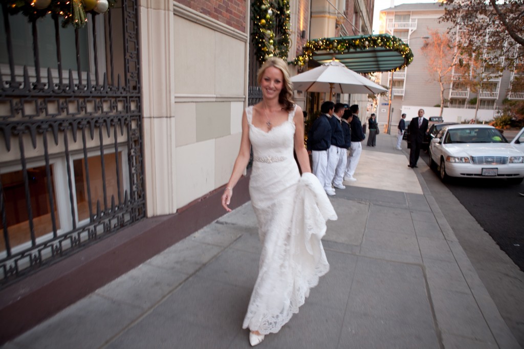 An unplanned moment - beautiful bride, city sidewalk.  Photo by Don't Smile Now/ Shani Barel.