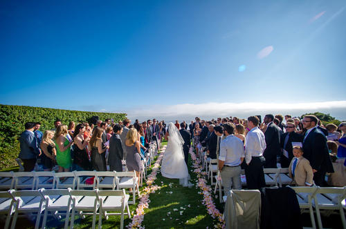 Visualizing an ocean view can also soothe your mind. Photo by Sam Lim Studios, florals by Flower Duet.