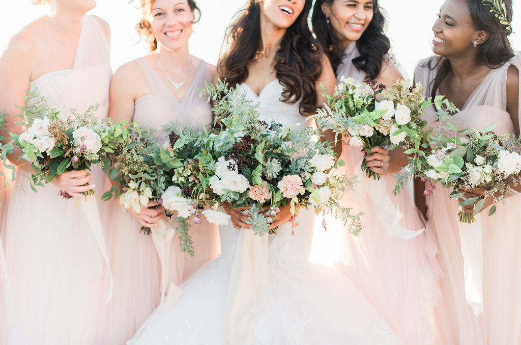 Bridesmaids Blush bridesmaid gowns greenery rustic bouquets