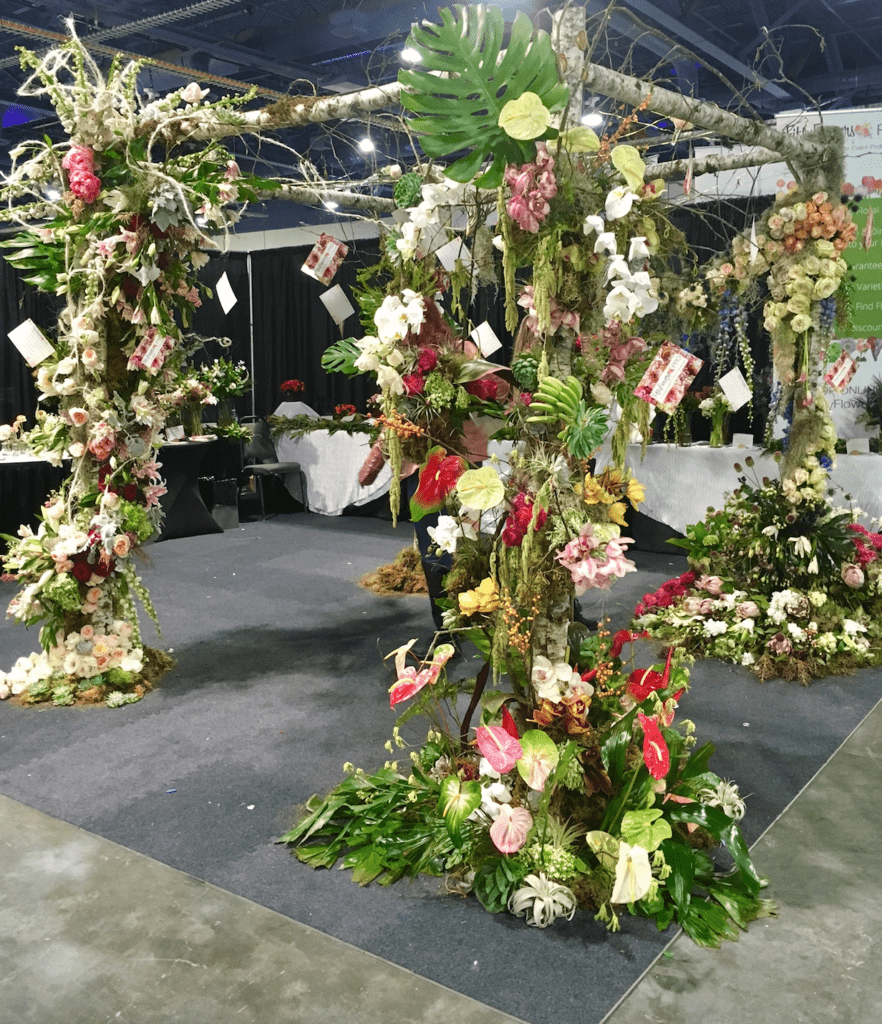 Chuppah with fruit and orchids from fifty flowers