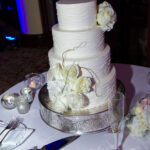ivory wedding cake rustic florals